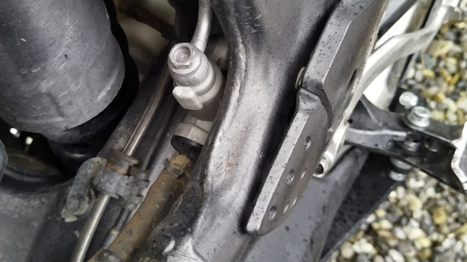 Karat pada Rangka Motor